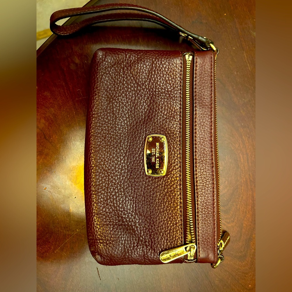 Michael Kors Wristlet Maroon Color. Double Zipper